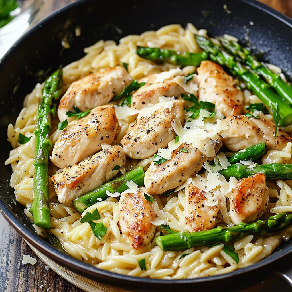 A bowl of chicken and asparagus.