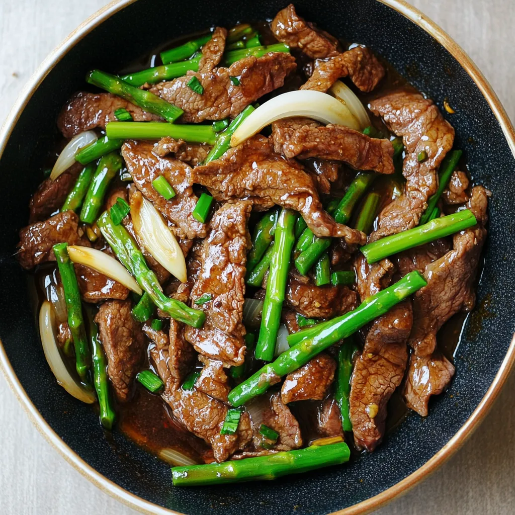 A bowl of beef and vegetables.